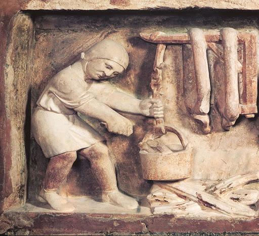 Benedetto Antelami, Acquario, formella del segno zodiacale dell'acquario nel Battistero di Parma con la raffigurazione dell'asciugatura di salami e salsicce in una cucina medievale, XII secolo.